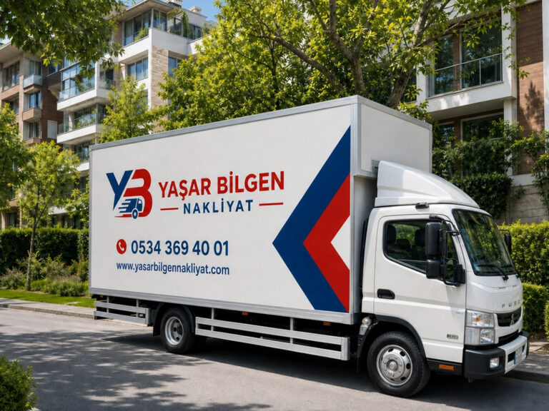 Yaşar Bilgen Nakliyat yazılı beyaz kapalı kasa kamyonet sokakta park halinde duruyor