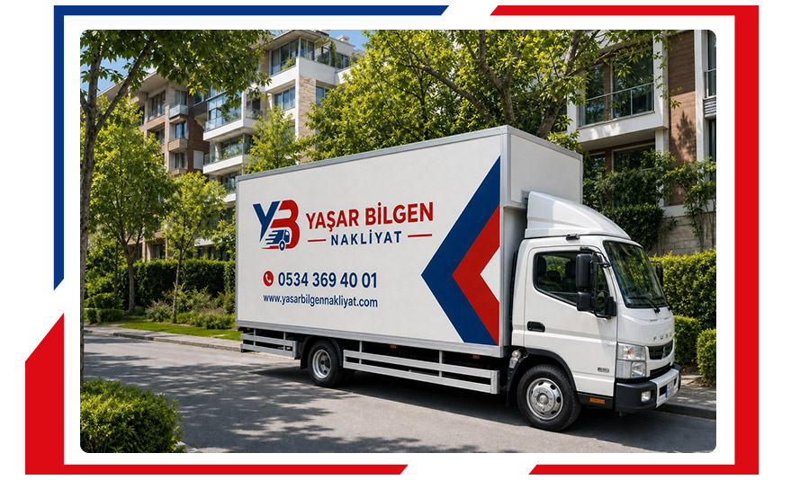 Yaşar Bilgen Nakliyat markalı beyaz nakliye kamyonu sokakta evden eve nakliyat hizmeti için park halindedir.